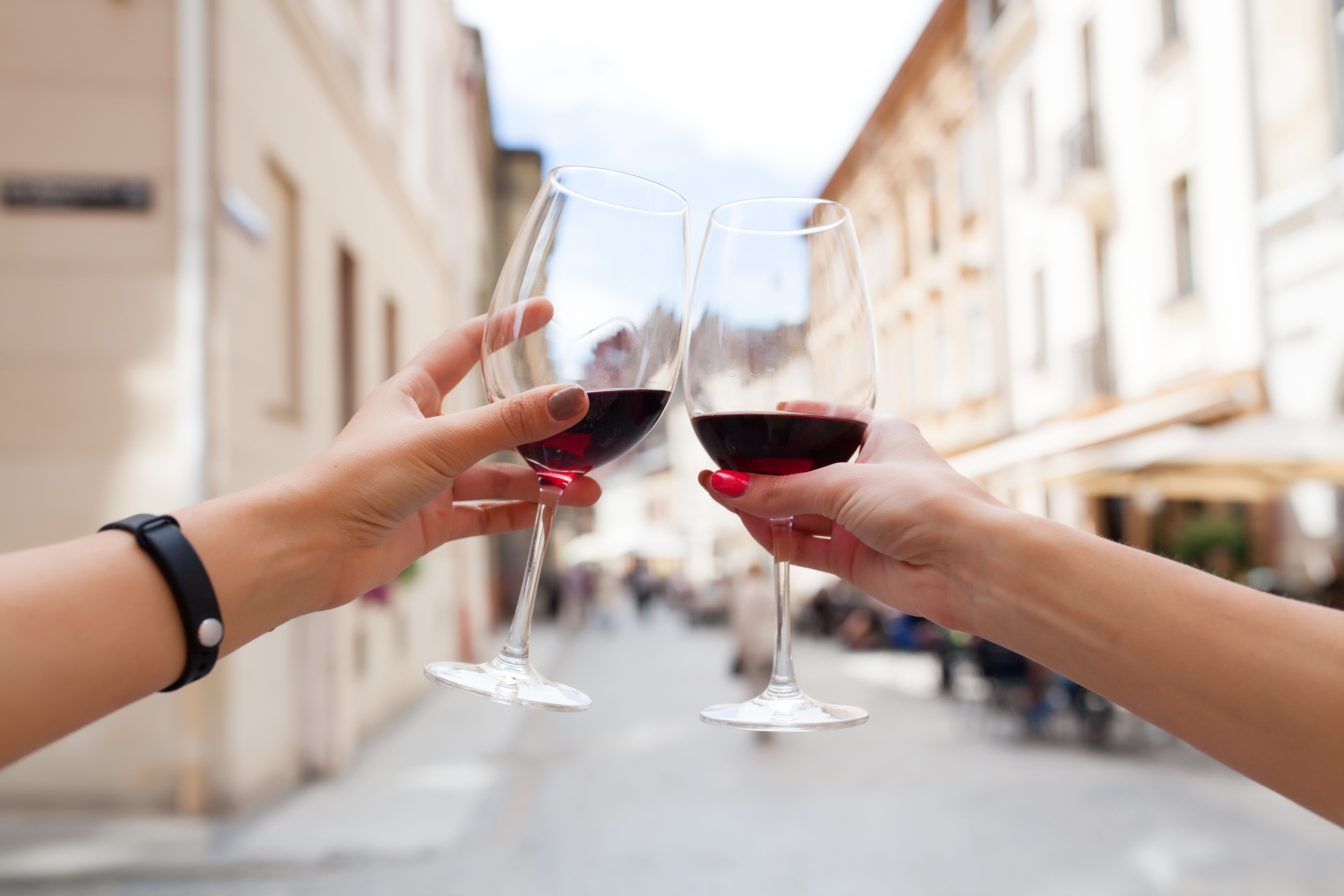 hands-close-up-couple-toasting-glasses-wine.jpg